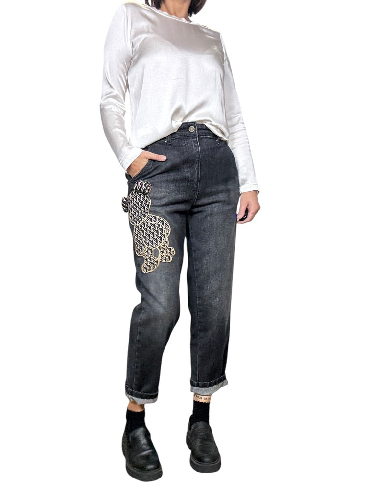 JEANS CON ORSETTO TENSIONE IN