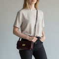 BORSETTA STAMPA COCCO - XE BLU Abbigliamento Donna